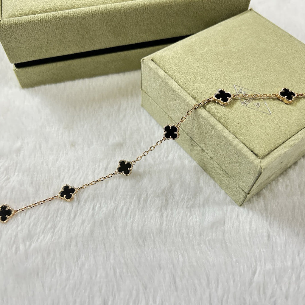 CLOVER 6 MOTIF ONYXS BRACELET
