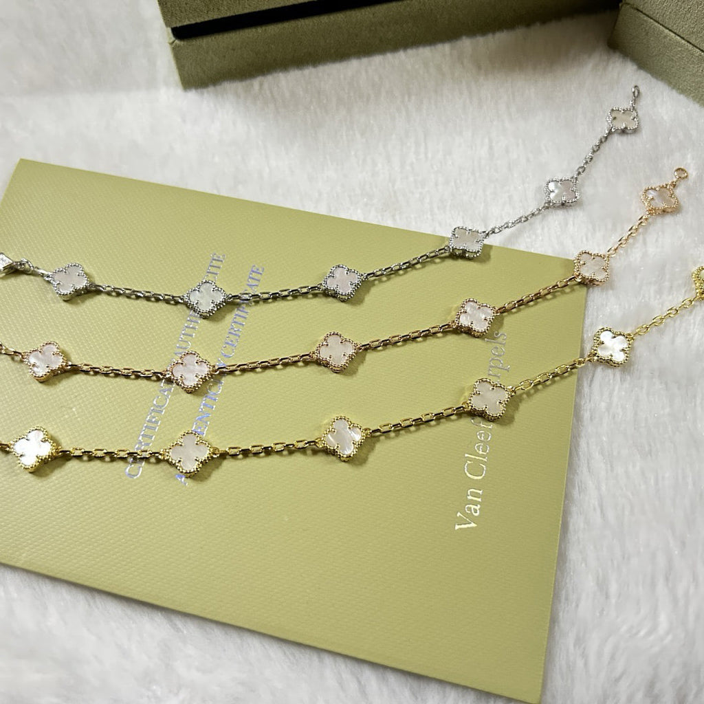 CLOVER 6 MOTIF WHITE MOP BRACELET